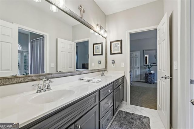 3665 Pennington Rd, Cumming, GA 30041 - full bathroom featuring double vanity and tile patterned floors