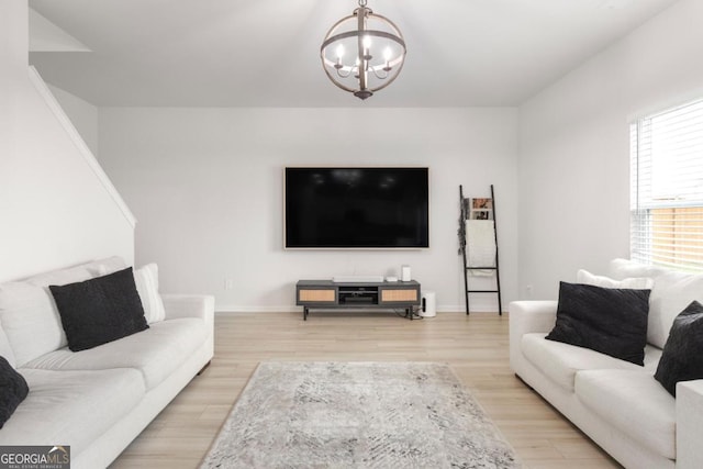 187 Lyndhurst Dr, Bethlehem, GA 30620 - living room with a chandelier and light wood finished floors