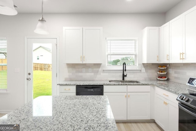 187 Lyndhurst Dr, Bethlehem, GA 30620 - kitchen with dishwasher, tasteful backsplash, white cabinetry, light wood finished floors, and range
