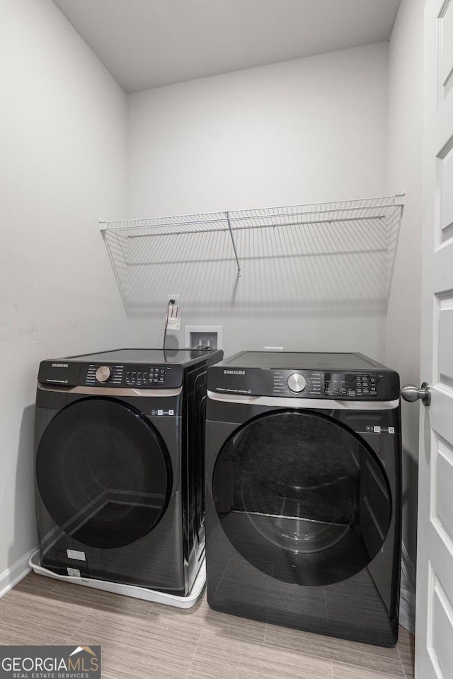 187 Lyndhurst Dr, Bethlehem, GA 30620 - washroom featuring washer and clothes dryer and baseboards