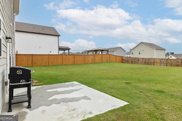 187 Lyndhurst Dr, Bethlehem, GA 30620 - fenced backyard featuring a patio and a gazebo