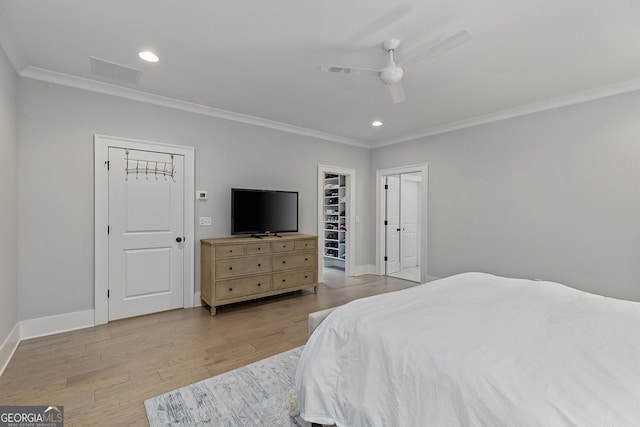357 Mell Ave Unit A, Atlanta, GA 30307 - bedroom with crown molding, light wood-style floors, baseboards, recessed lighting, and ceiling fan