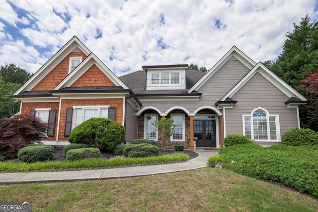 1997 Shaker Falls Ln, Lawrenceville, GA 30045 - view of front of home with roof with shingles, french doors, and a front lawn