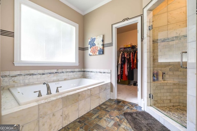 1997 Shaker Falls Ln, Lawrenceville, GA 30045 - full bath with crown molding, a stall shower, a bath, stone finish flooring, and a spacious closet