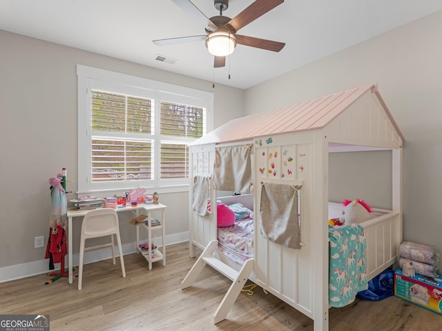 319 S Mount Carmel Rd, Mcdonough, GA 30253 - bedroom featuring wood finished floors, baseboards, and ceiling fan