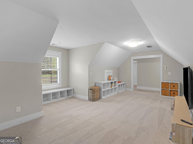 319 S Mount Carmel Rd, Mcdonough, GA 30253 - bonus room with lofted ceiling, light colored carpet, and baseboards