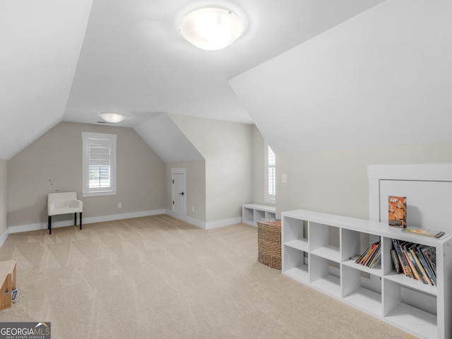 319 S Mount Carmel Rd, Mcdonough, GA 30253 - bonus room with vaulted ceiling, carpet flooring, and baseboards
