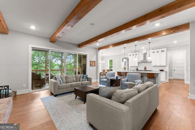 4847 Destitute Way, Gainesville, GA 30506 - living room with a fireplace, beamed ceiling, light wood finished floors, and recessed lighting