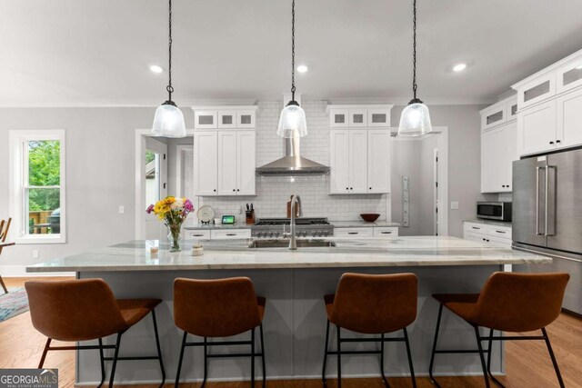 4847 Destitute Way, Gainesville, GA 30506 - kitchen featuring stainless steel appliances, wall chimney range hood, recessed lighting, decorative backsplash, and white cabinetry