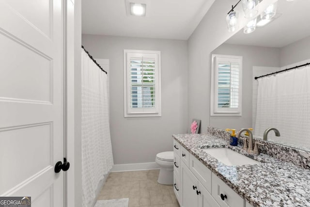 4847 Destitute Way, Gainesville, GA 30506 - full bath featuring vanity, baseboards, toilet, a shower with shower curtain, and tile patterned flooring