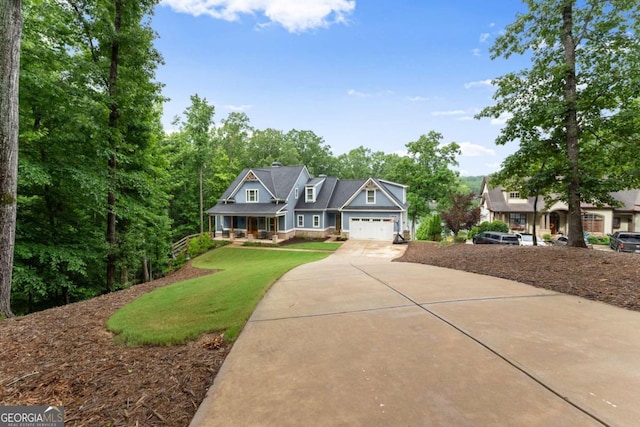 4847 Destitute Way, Gainesville, GA 30506 - craftsman house featuring concrete driveway, a porch, a front yard, and an attached garage