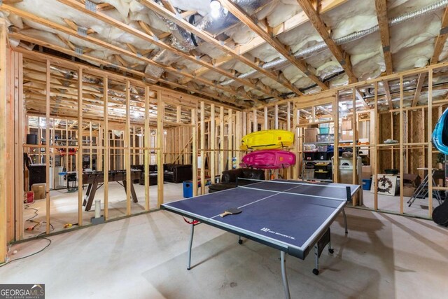 4847 Destitute Way, Gainesville, GA 30506 - view of patio featuring a trampoline, view of wooded area, and outdoor dining space