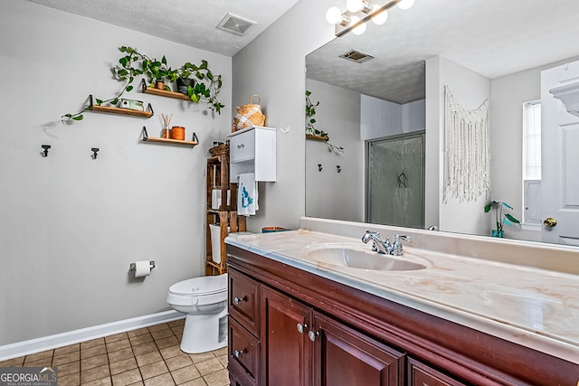 161 Mills Dr, Covington, GA 30016 - bathroom with vanity, a stall shower, toilet, tile patterned flooring, and baseboards