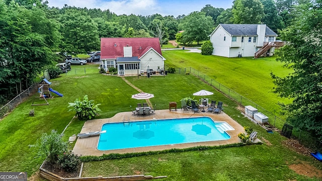 161 Mills Dr, Covington, GA 30016 - view of pool with a diving board, a patio area, and outdoor dining area