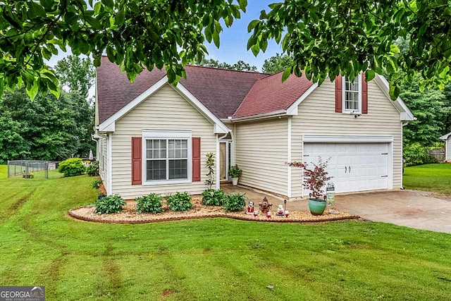 161 Mills Dr, Covington, GA 30016 - view of front of home with concrete driveway, a garage, and roof with shingles