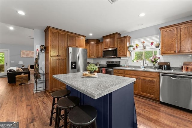 15 Baker St, Dahlonega, GA 30533 - kitchen with stainless steel appliances, healthy amount of natural light, dark wood finished floors, and recessed lighting