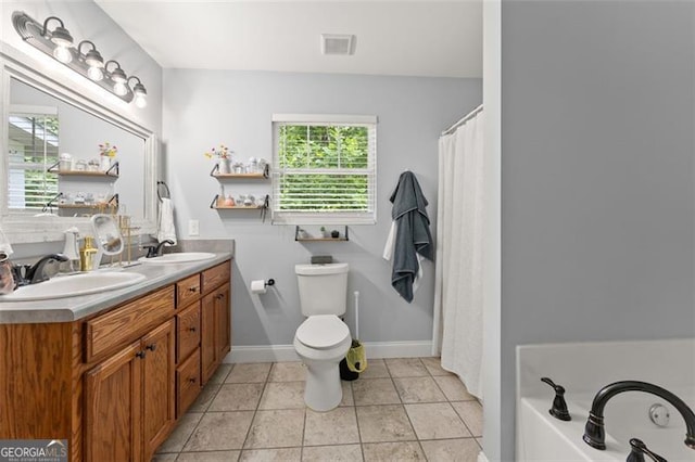 15 Baker St, Dahlonega, GA 30533 - bathroom with double vanity, a bath, and tile patterned floors