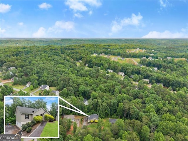 15 Baker St, Dahlonega, GA 30533 - aerial view of property and surrounding area with a heavily wooded area and property boundaries highlighted