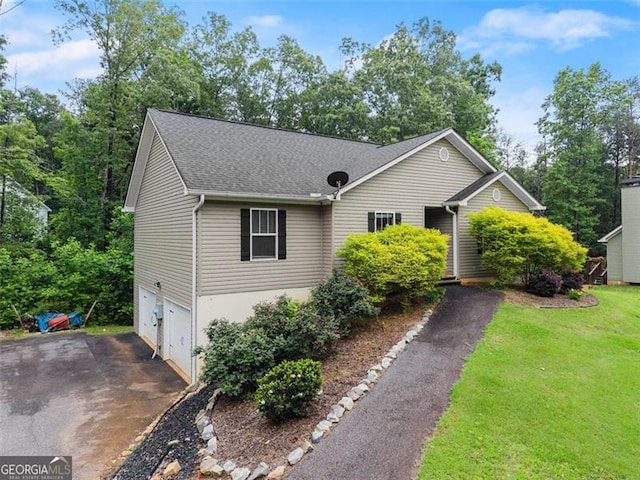 15 Baker St, Dahlonega, GA 30533 - view of front facade featuring asphalt driveway, an attached garage, a front yard, and a shingled roof