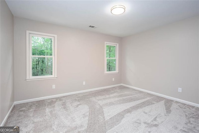 4806 Deer Chase, Powder Springs, GA 30127 - empty room with healthy amount of natural light, carpet floors, and baseboards