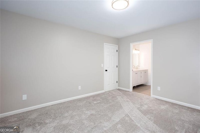 4806 Deer Chase, Powder Springs, GA 30127 - unfurnished bedroom with light carpet, baseboards, and ensuite bath