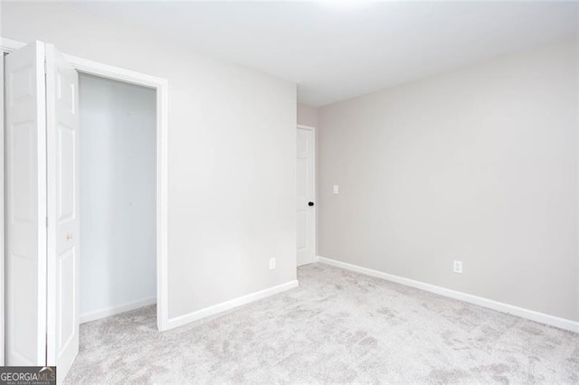 4806 Deer Chase, Powder Springs, GA 30127 - unfurnished bedroom with carpet, baseboards, and a closet