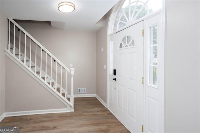 4806 Deer Chase, Powder Springs, GA 30127 - entrance foyer featuring wood finished floors, stairway, and baseboards