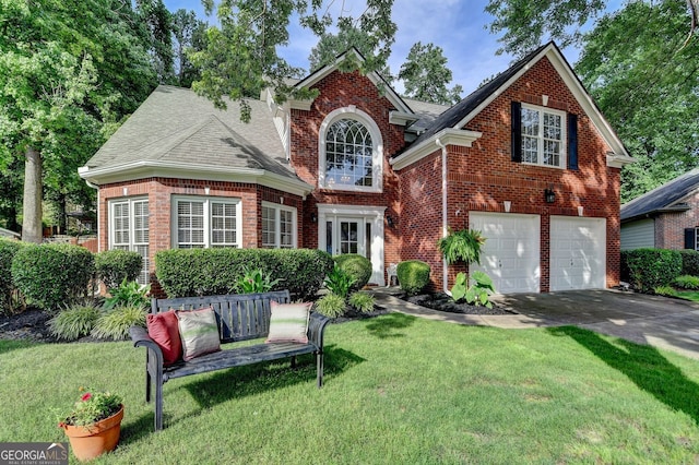 2633 Hanriva Ct, Dacula, GA 30019 - traditional-style home with brick siding, a garage, a front yard, and asphalt driveway