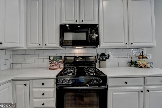 2633 Hanriva Ct, Dacula, GA 30019 - kitchen with black appliances, white cabinetry, decorative backsplash, and light stone counters