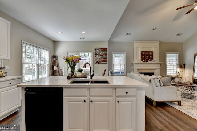 2633 Hanriva Ct, Dacula, GA 30019 - kitchen with a sink, black dishwasher, dark wood-style floors, plenty of natural light, and recessed lighting