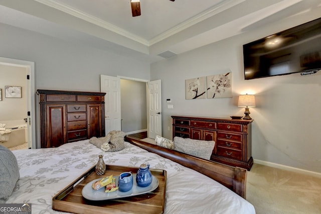 2633 Hanriva Ct, Dacula, GA 30019 - carpeted bedroom with crown molding, ceiling fan, and ensuite bathroom