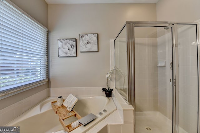 2633 Hanriva Ct, Dacula, GA 30019 - bathroom with a shower stall and a garden tub