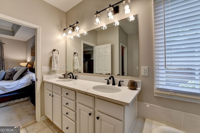 2633 Hanriva Ct, Dacula, GA 30019 - ensuite bathroom with double vanity, tile patterned flooring, and a tub to relax in