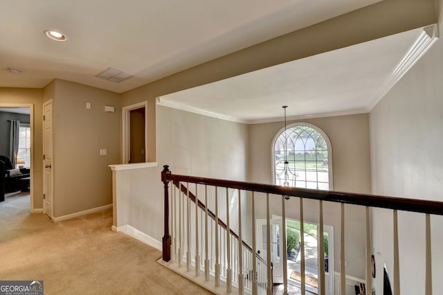 2633 Hanriva Ct, Dacula, GA 30019 - hallway featuring an upstairs landing, light carpet, baseboards, ornamental molding, and recessed lighting