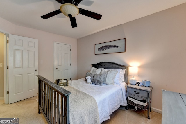 2633 Hanriva Ct, Dacula, GA 30019 - bedroom with light colored carpet, baseboards, and ceiling fan