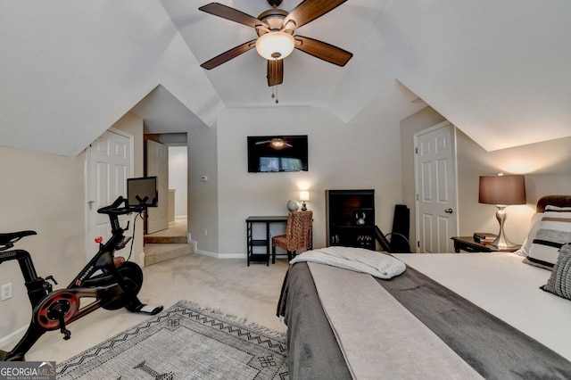 2633 Hanriva Ct, Dacula, GA 30019 - bedroom featuring light colored carpet, lofted ceiling, baseboards, and a ceiling fan