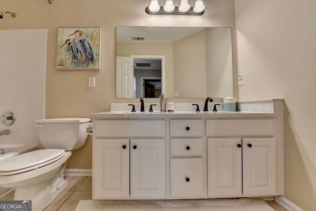 2633 Hanriva Ct, Dacula, GA 30019 - bathroom featuring double vanity, tile patterned flooring, and tub / shower combination