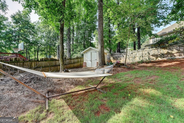 2633 Hanriva Ct, Dacula, GA 30019 - fenced backyard with a storage shed