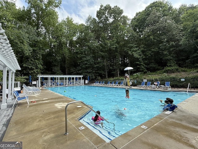 2633 Hanriva Ct, Dacula, GA 30019 - community pool with a patio area