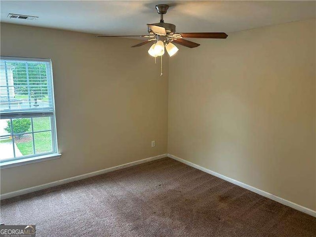 3140 Tylerton Dr SW, Atlanta, GA 30311 - empty room with carpet and a ceiling fan