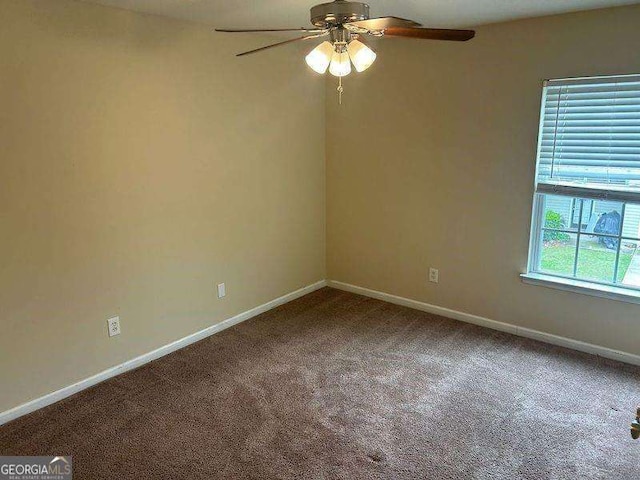 3140 Tylerton Dr SW, Atlanta, GA 30311 - carpeted spare room featuring a ceiling fan and baseboards