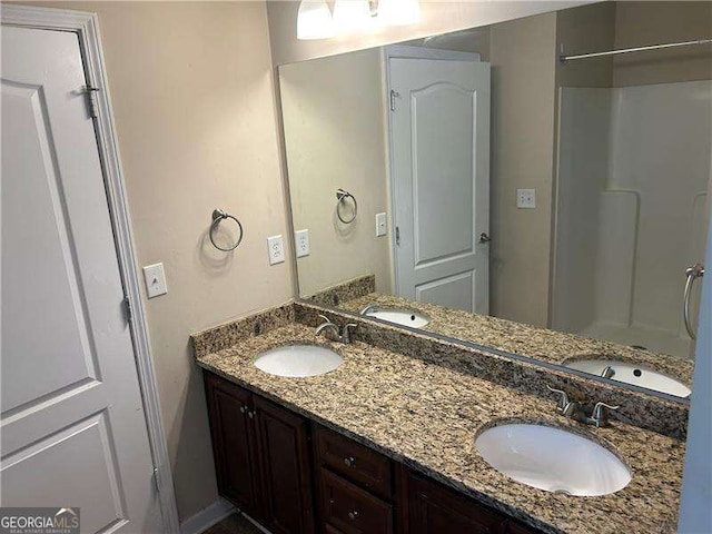 3140 Tylerton Dr SW, Atlanta, GA 30311 - full bath featuring double vanity and a shower