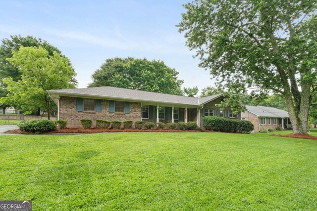 2644 Hickory Valley Dr, Snellville, GA 30078 - single story home featuring a front yard and brick siding