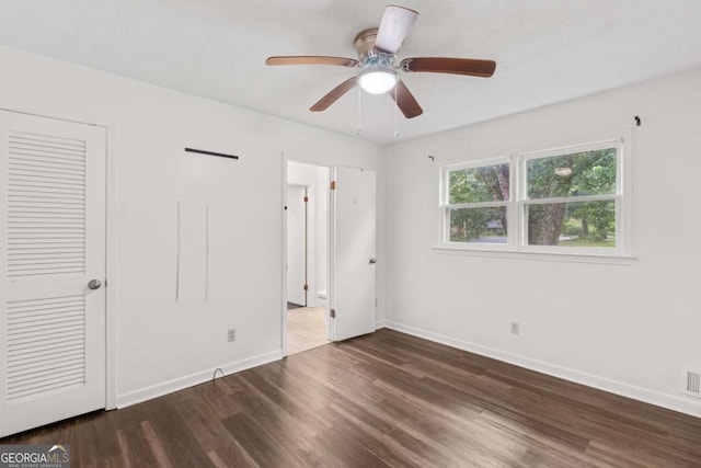 2644 Hickory Valley Dr, Snellville, GA 30078 - unfurnished bedroom with wood finished floors and a ceiling fan