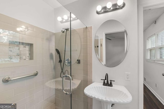 2644 Hickory Valley Dr, Snellville, GA 30078 - bathroom with a shower stall and wood finished floors