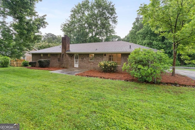 2644 Hickory Valley Dr, Snellville, GA 30078 - back of property with a chimney and brick siding