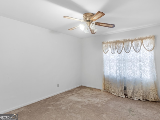 1727 Briarcliff Rd, Milledgeville, GA 31061 - empty room with carpet and a ceiling fan