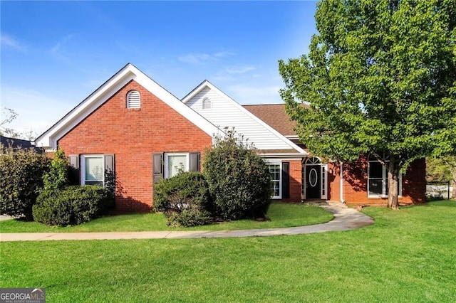 4820 Camden Dr SW, Conyers, GA 30094 - view of front of property featuring brick siding and a front lawn