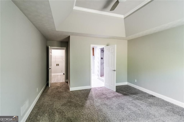 4820 Camden Dr SW, Conyers, GA 30094 - unfurnished bedroom with carpet floors, baseboards, a tray ceiling, crown molding, and a ceiling fan