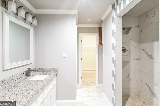 4820 Camden Dr SW, Conyers, GA 30094 - full bathroom featuring marble look tiles, a marble finish shower, vanity, crown molding, and baseboards